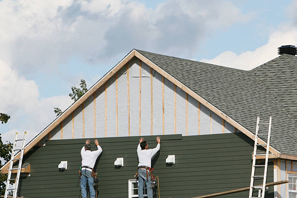 Professional Siding technician working in Eaton, OH